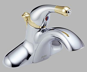 lead free Delta Diamond Seal lavatory faucet, shown in chrome with polished brass accents