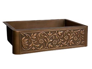 Single bowl copper farmer sink with botanical  motif