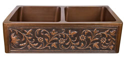 Double bowl copper farmer sink with botanical motif