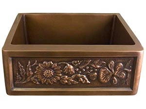 Single bowl copper farmer sink with sunflower motif front
