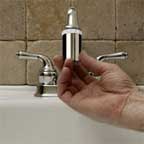 Image of faucet light being installed