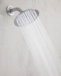 Photo of the round Rain Machine shower head, shown in chrome