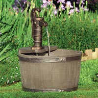 whiskey barrel garden fountain