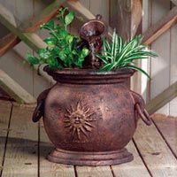 copper kettle with planter garden fountain