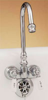 Photo f installed gooseneck leg tub faucet, shown in chrome