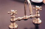 old fashion metal cross handle lav faucets from sign of the crab