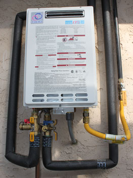 Here's our install and finished Takagi tankless water heater - installed outside.