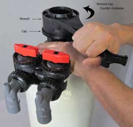 demonstration picture of acid neutralizer cap removal