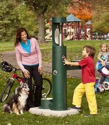 Family using outdoor bottle filler