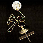 Old-fashioned sink stopper with chain