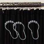 Shower curtain and shower curtain rings