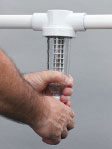 an image of someone removing the spin-down water filter housing